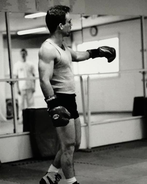 Old photo of head instructor sparring.
